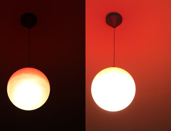 two images of the (overexposed) lamp that show the ceiling glowing red-ish